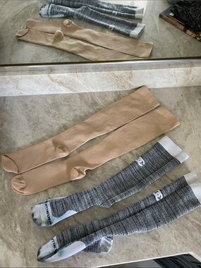 2 COMPRESSION SOCKS. Size Small/ 5-7 . Nude is brand new and grey is used